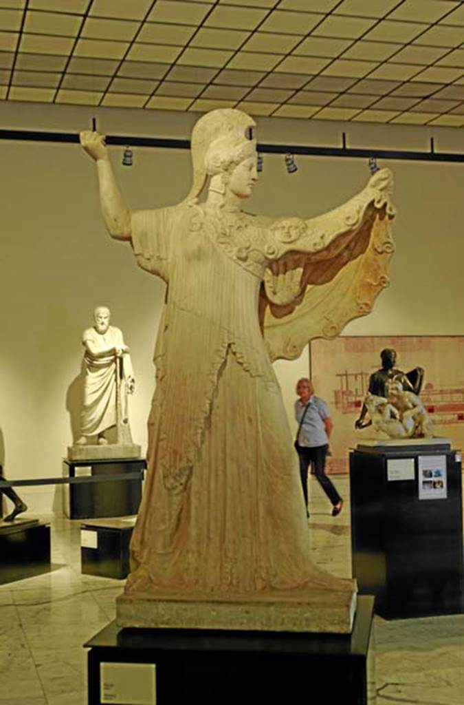 Villa dei Papiri, Herculaneum. Marble statue of Athena Promachos. Found in 1752, between columns on east side of peristyle.
Now in Naples Archaeological Museum. Inventory number 6007.